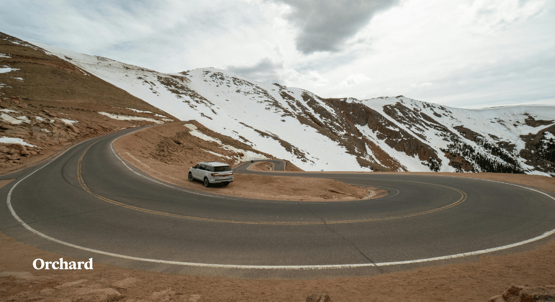 scenic drives Colorado mountain backroad winding through alpine terrain